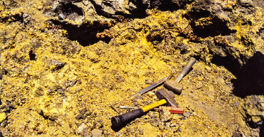 Collecting orpiment specimens in the pocket-rich zone. Collector’s Edge photo.