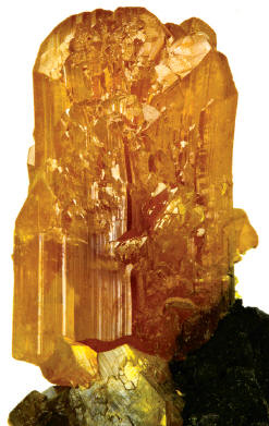 Orpiment crystal 3.2 cm high on matrix. 