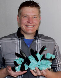 Tim proudly holding “Porcupine” after cleaning was finished. K. Velasco photo.