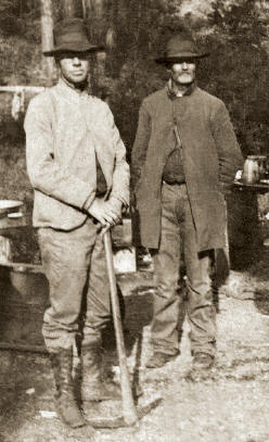 Photo taken in the Dallas Gem mine in 1907 showing Roderic Dallas (left), first owner of the mine, and James Couch (right), discoverer of the deposit. Photo courtesy of Collector’s Edge.