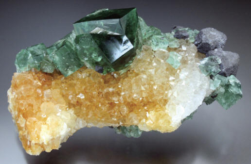 Fluorite on quartz from Dodgy Bugger Pocket, 9 cm wide. UKMV specimen. J. Fisher photo.