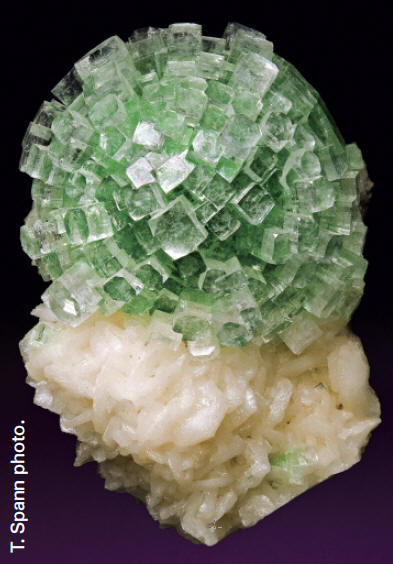“Disco ball” apophyllite-(KF) on stilbitefrom the 2001 find in Momin Akhada, Rahuri,India. 13 cm tall. G. and J. Spanncollection.