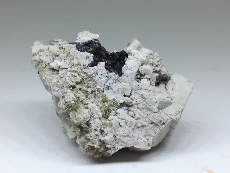 Quartz and asbestos metasomatic pseudomorph fluorite mineral crystal gem stone ore samples.,Fluorite