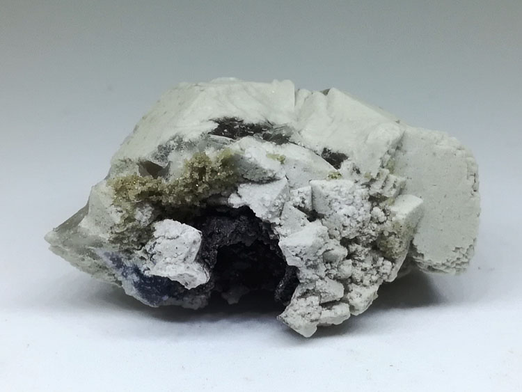 Quartz and asbestos metasomatic pseudomorph fluorite mineral crystal gem stone ore samples.,Fluorite