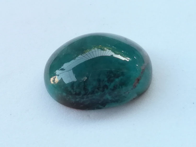 Opaque blue green on sale gemstone