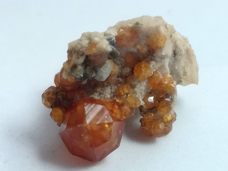 Very prominent orange-red manganese-alumina garnet fendarite crystal mineral specimen gemstone proto,Garnet